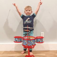 Nickelodeon Paw Patrol stand and drums illustrate stable setup for playtime.