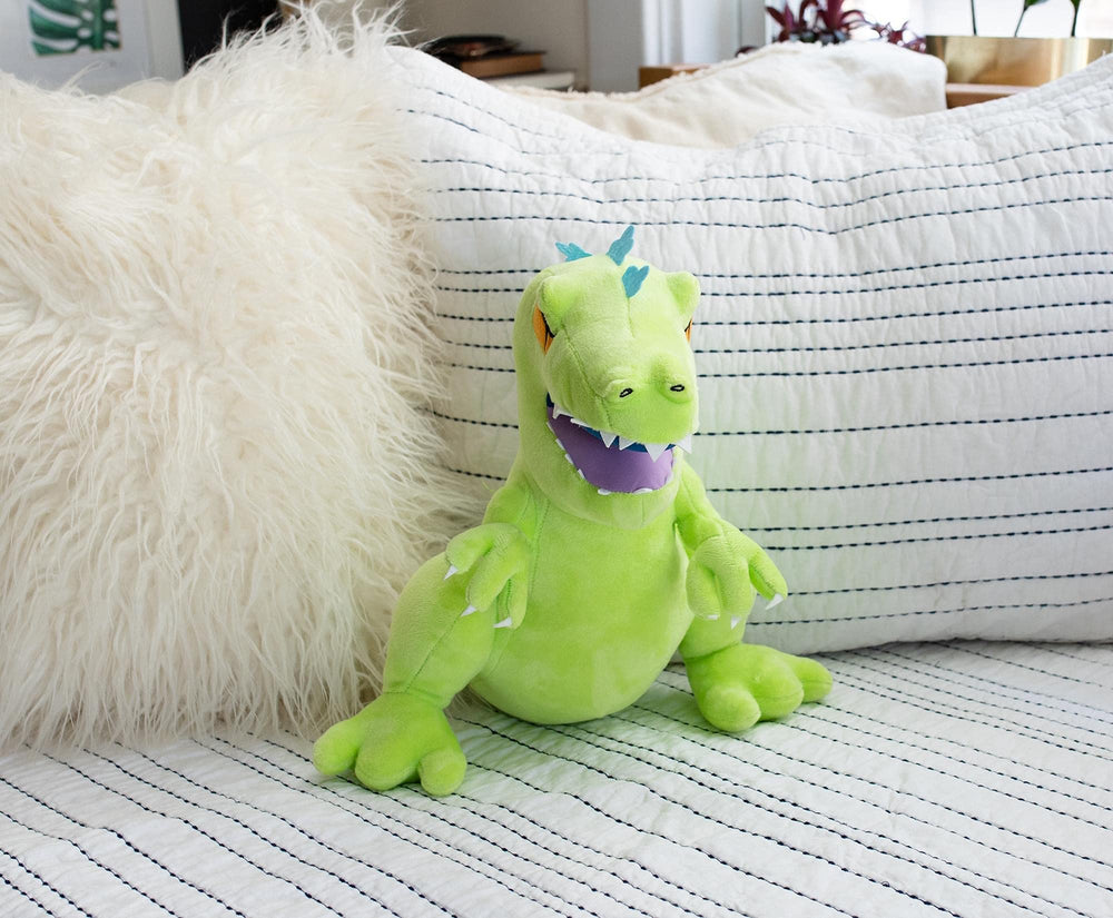 Nickelodeon Rugrats Reptar with blue spikes and claws for authentic look.