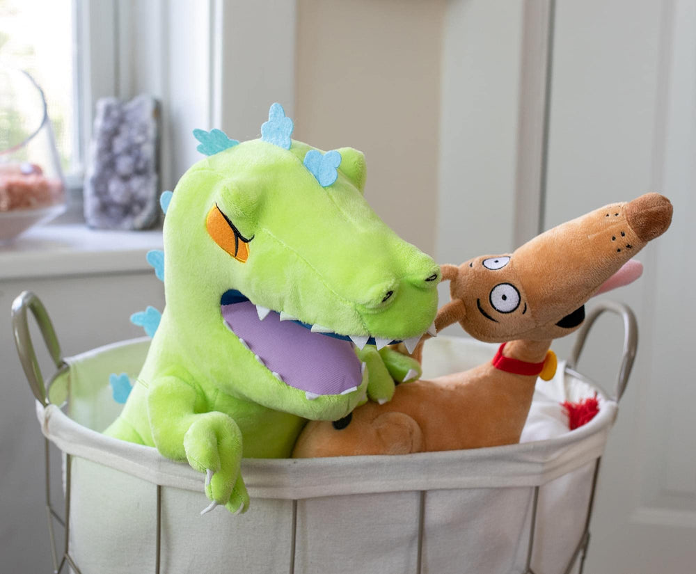 Nickelodeon Rugrats Reptar hugging pose makes a soft cuddle buddy.