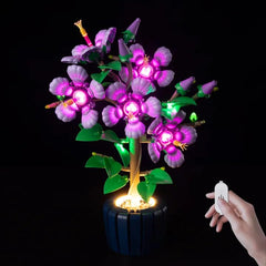 Nitemode light kit installed on Lego Hibiscus 10372 creates vibrant display.