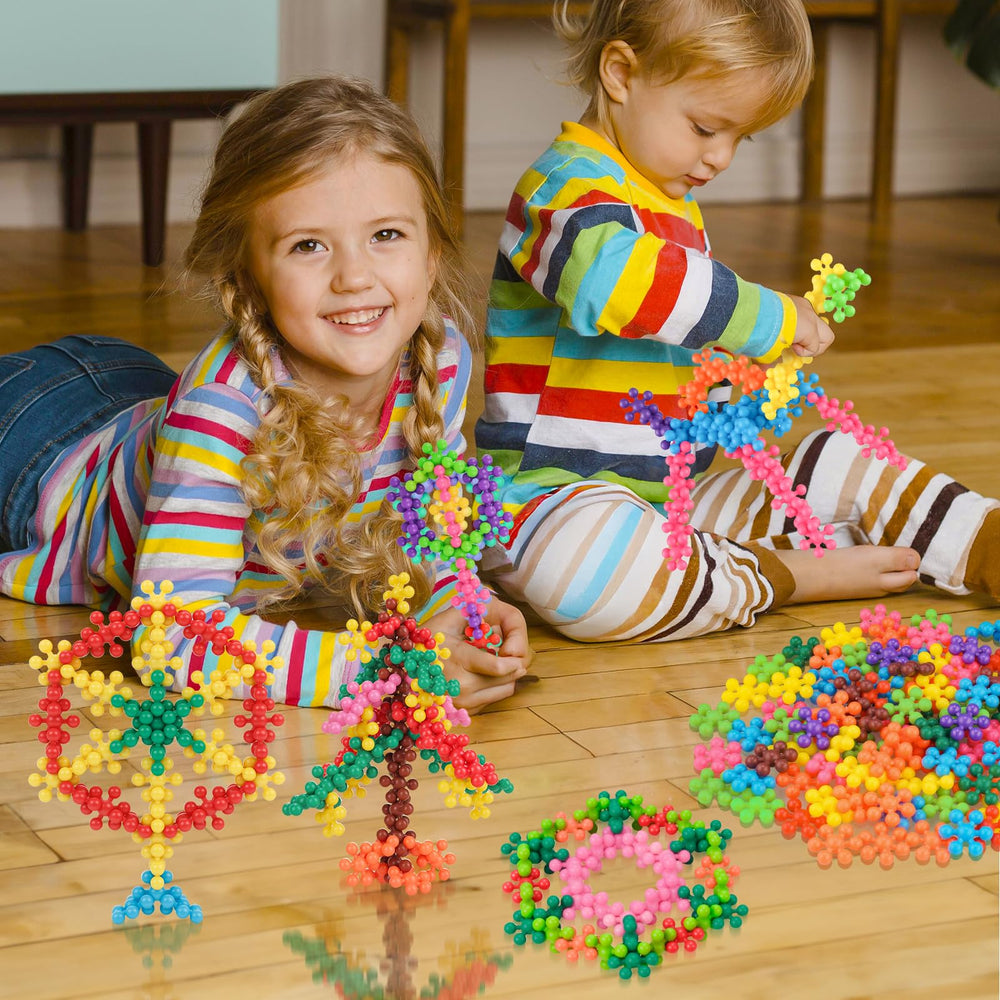 NiToy rainbow blocks support collaborative play and shared creativity.