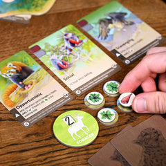 North Star Games Nature Board Game traits clawed shows prey hunting for ecosystem balance.