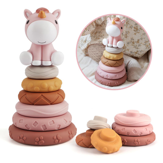 Nueplay stacking rings with soft textures for tactile exploration during play.