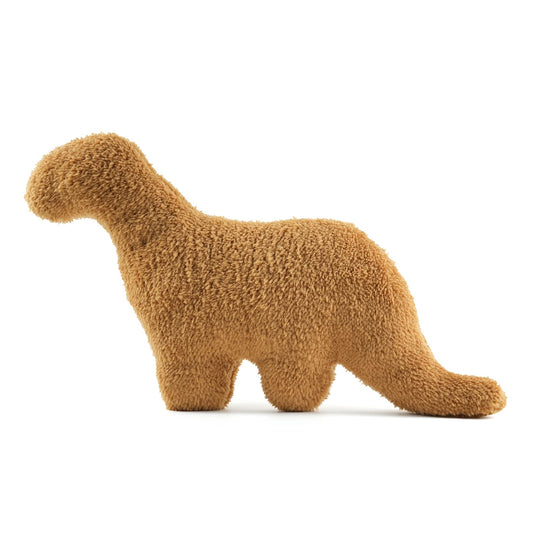 NXCHIZS dino nugget pillow on bed adds cozy bedtime decor.