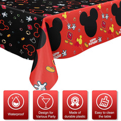 Nyhpar mouse-themed tablecloth setup for cake area and photo moments.