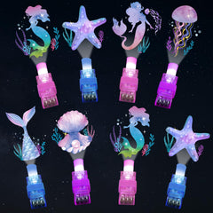 Oitnlaughter Mermaid LED finger light showing mermaid pattern for ocean party favors.
