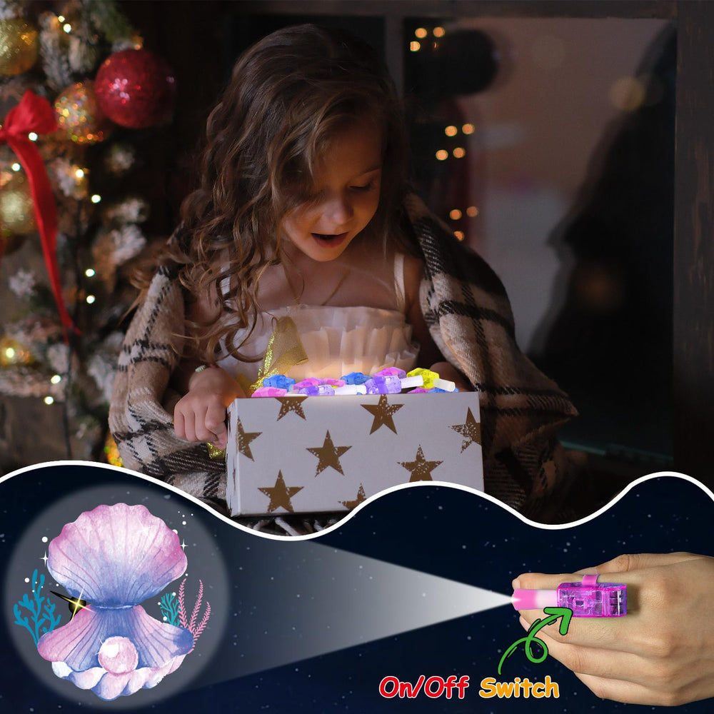 Oitnlaughter mermaid design finger light worn for glow party moments.