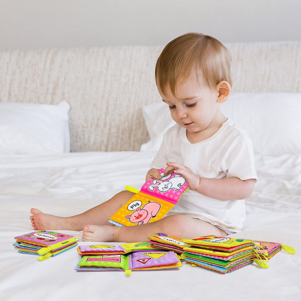 OKOOKO soft books ready to clip on stroller or crib.