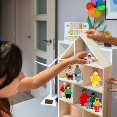 ONEST wooden dollhouse figures set up for pretend play in classroom or home