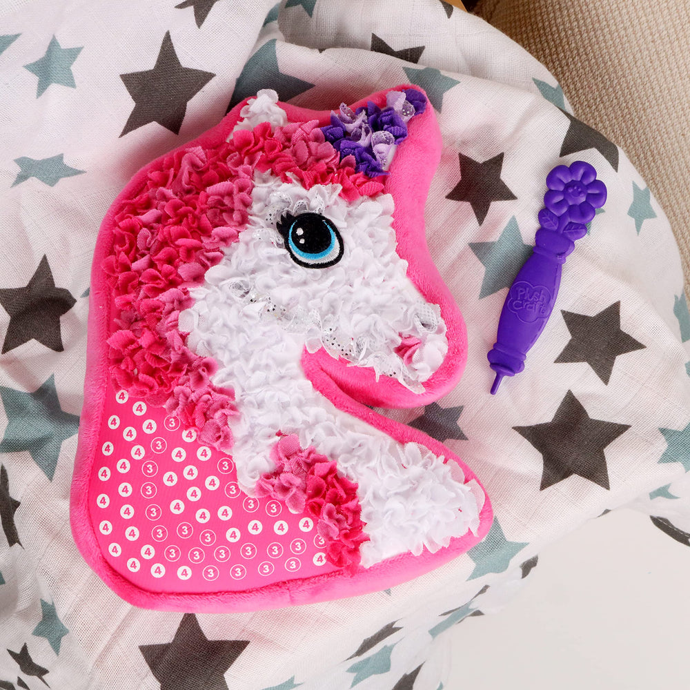The Orb Factory PlushCraft kit includes 324 pieces for a complete cozy unicorn pillow.