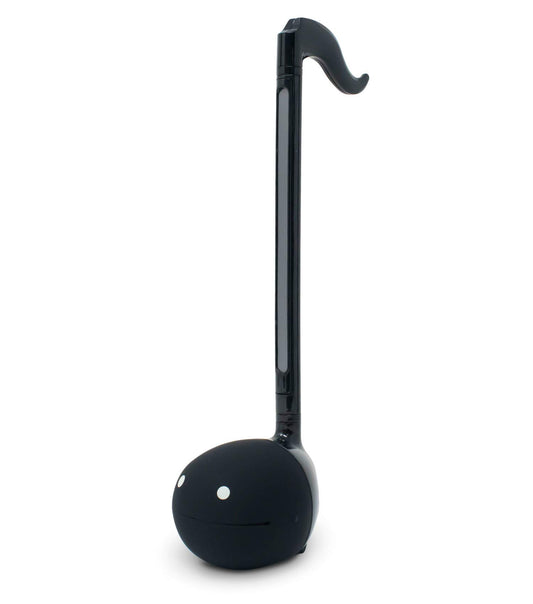Otamatone black body closeup showcasing compact design for travel.