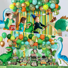 Ouddy Party orange dinosaur foil balloons brighten the celebration space.