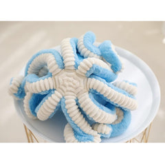 OUKEYI octopus plush big eyes, friendly bedtime companion.