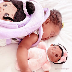 OUOZZZ black baby doll makes a charming room decor addition for cozy play areas