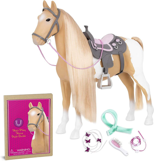 Our Generation Palomino Horse ready for pretend riding and grooming