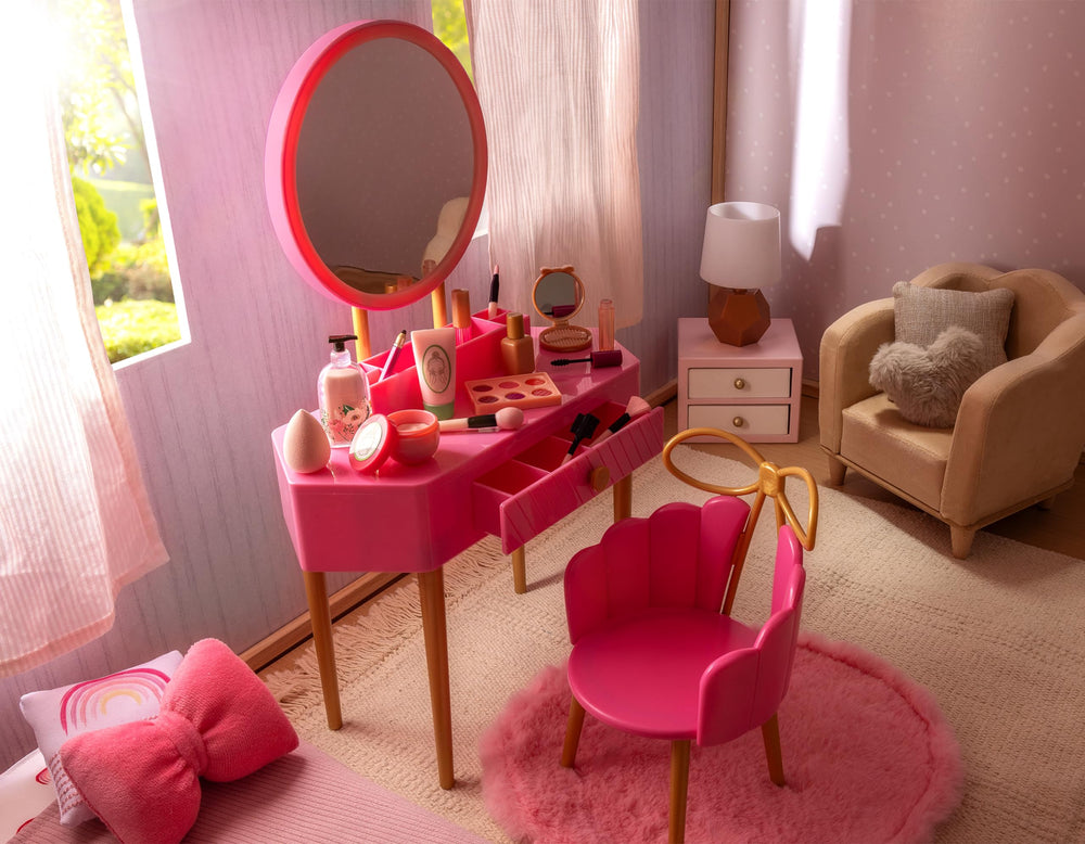 Our Generation pink vanity chair provides comfy seating during playtime.