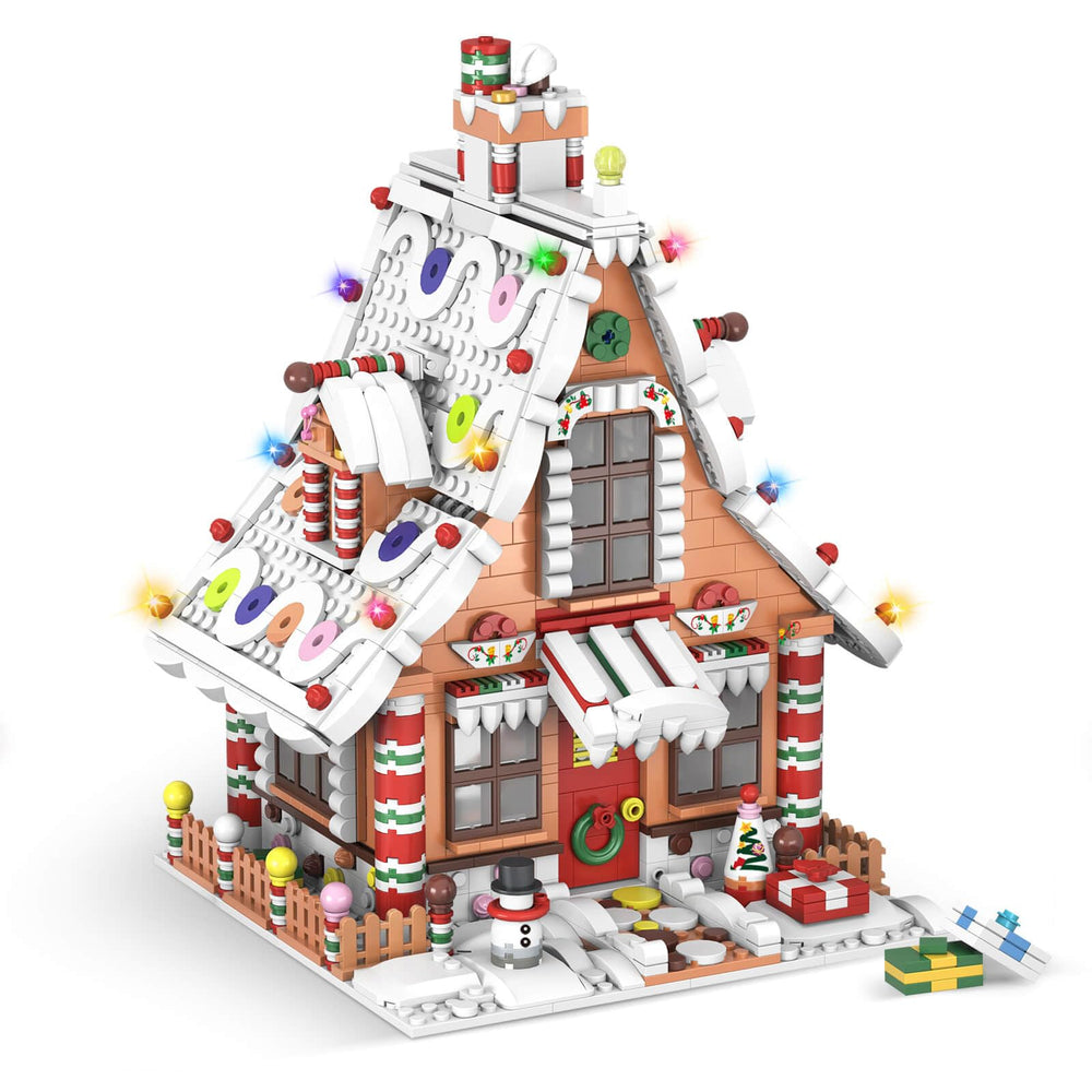OUTMX Christmas Gingerbread House with LED exterior lights for festive display.
