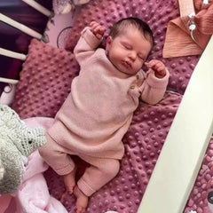 OYESY 20-inch reborn doll showcases sleeping smile perfect for comforting play