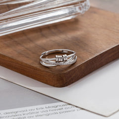 Shiny cubic zirconia detail on the PABBEU spinner ring