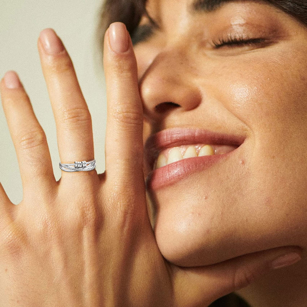 Open-band adjustable design on the PABBEU anxiety ring