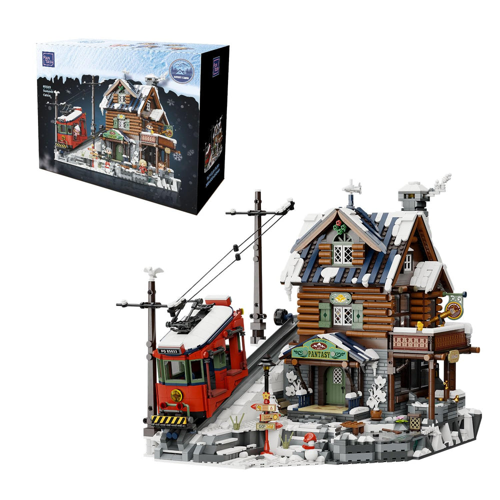 Pantasy Winter Summit lodge exterior shows a cozy alpine display for holidays.