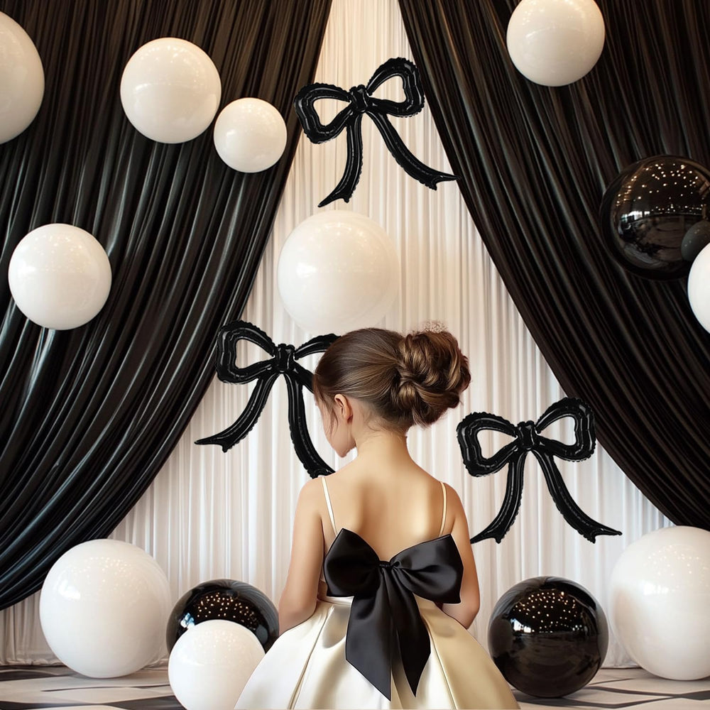 PartyXpress bachelorette party bows elevate party aesthetics with dramatic black accents.