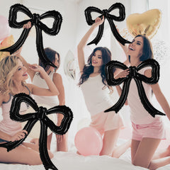 PartyXpress cheetah accent bows add bold contrast to black-and-white palettes.