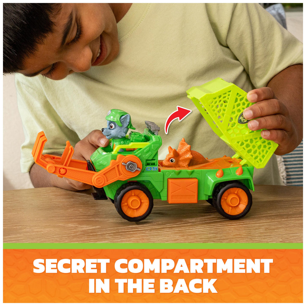 PAW Patrol Rocky Recycler with back compartment open demonstrating secure dino storage