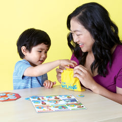Peaceable Kingdom tokens and helping bag enabling collaborative problem solving