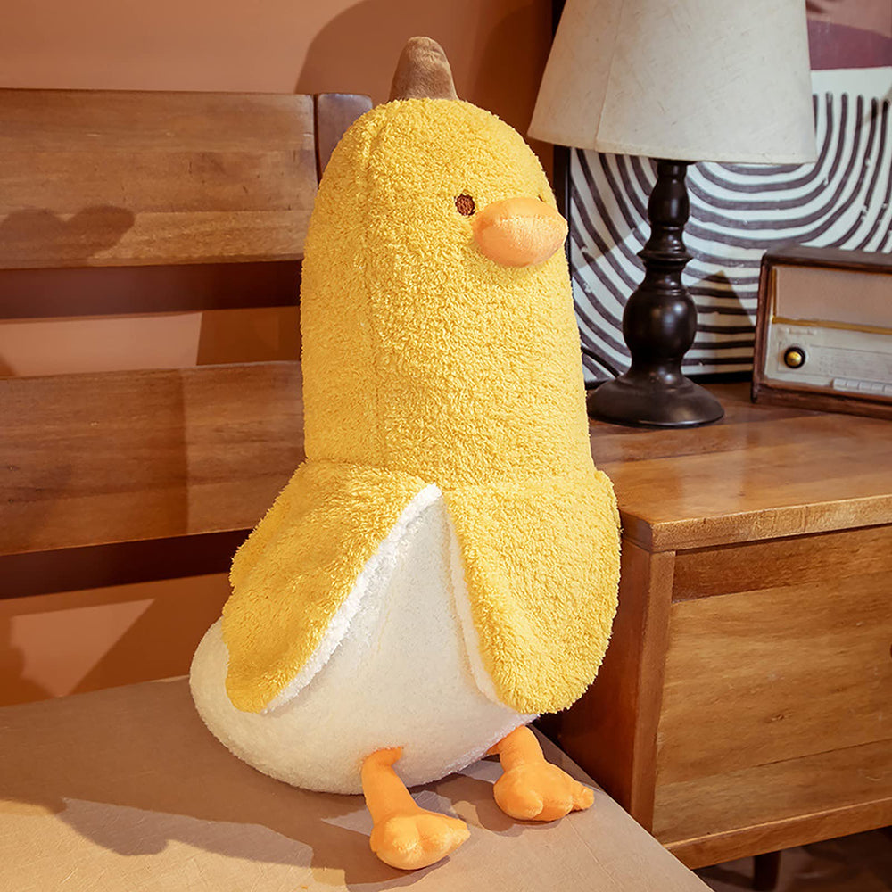 PEACH CAT Banana Duck plush by the bed for bedtime comfort.