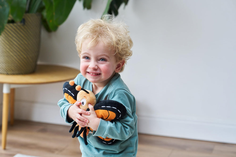 Pebbles butterfly flexible legs and soft antennae support safe pretend flights.