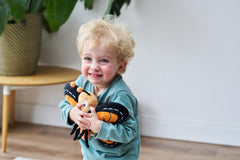 Pebbles butterfly flexible legs and soft antennae support safe pretend flights.
