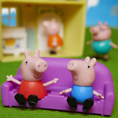 Four Peppa Pig figures ready for family adventures in the car