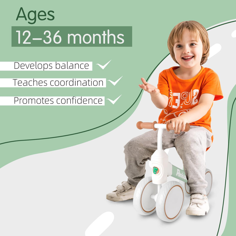 PerKidern balance bike green side view emphasizes four-wheel stability for safe indoor play.