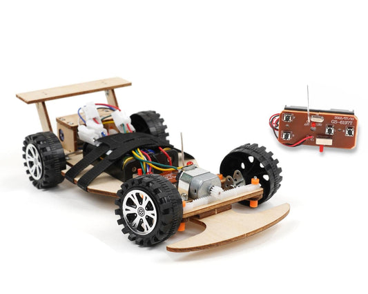 Pica Toys F1 assembly scene shows hands building a wooden RC car for STEM learning