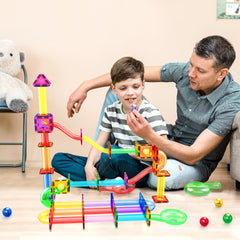 PicassoTiles magnetic building tiles create colorful race tracks and constructions.