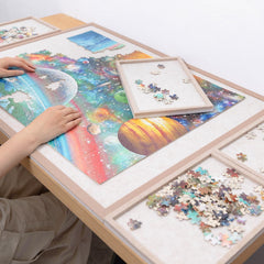 Piecevana puzzle board lip edge aids easy transfer of finished sections.