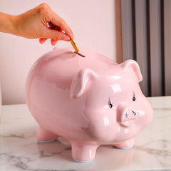 Gift-ready money jar displayed with festive accents.
