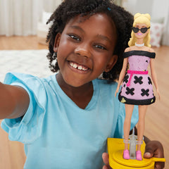 Play-Doh Barbie accessories like bows and shoes enhance final looks.