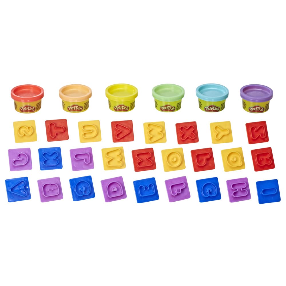 Play-Doh Fundamentals alphabet practice stampers in use for letter familiarity.
