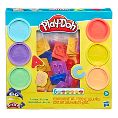 Play-Doh Fundamentals letters stampers in action for alphabet practice and color recognition.