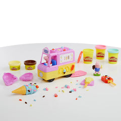 Play-Doh George figure seated in truck to support sibling storytelling