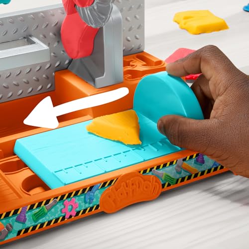 Play-Doh Stamp & Saw Tool Bench handheld stamper action for stamping fun