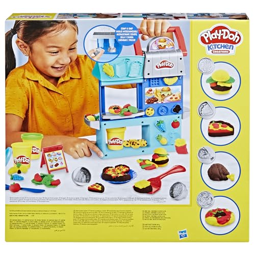 Play-Doh Kitchen Creations Busy Chef's Restaurant Playset stampers create burgers and pizzas quickly.