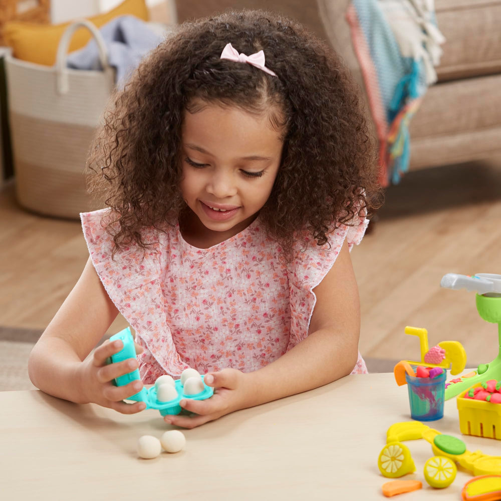 Play-Doh serving plates and tools support playful kitchen rituals.