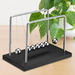 Playbees Newton's Cradle is a versatile birthday gift idea.