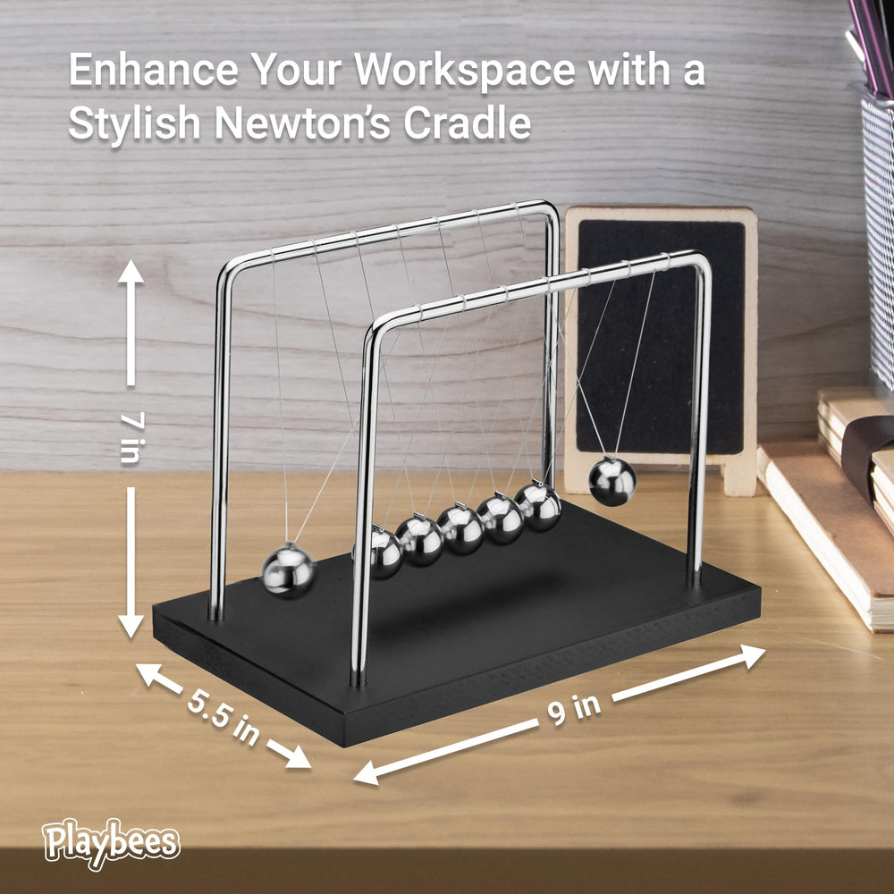 Playbees Newton's Cradle used as classroom demonstration of energy and gravity.