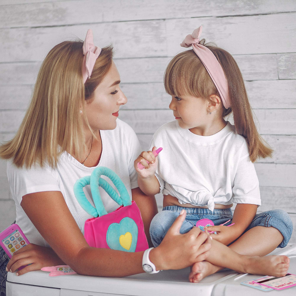 Playkidz purse storage keeps treasures tidy during playtime.