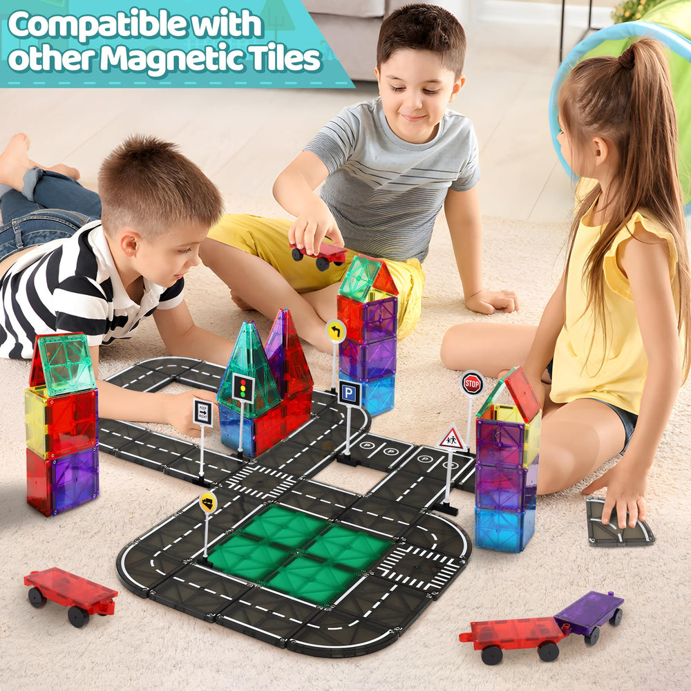 Close-up of Playmags road tiles showing magnets and glossy surface.