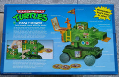 PlayMates TMNT Pizza Thrower Vehicle side view highlights rotating launcher for dynamic adventures.